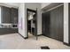 Modern kitchen with laundry and pantry access at 3282 E Palo Verde Dr, Paradise Valley, AZ 85253