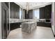 Modern kitchen with marble island and dark cabinetry at 3282 E Palo Verde Dr, Paradise Valley, AZ 85253