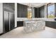 Modern kitchen with marble island and dark cabinetry at 3282 E Palo Verde Dr, Paradise Valley, AZ 85253