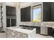 Modern kitchen with marble island and dark cabinetry at 3282 E Palo Verde Dr, Paradise Valley, AZ 85253