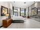 Luxurious main bedroom with plush bed, fireplace, and mountain views at 3282 E Palo Verde Dr, Paradise Valley, AZ 85253
