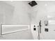 Large walk-in shower with rainfall shower heads and marble tile at 3282 E Palo Verde Dr, Paradise Valley, AZ 85253