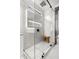 Walk-in shower with marble tile and built-in bench at 3282 E Palo Verde Dr, Paradise Valley, AZ 85253