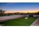 Outdoor space featuring a putting green and artificial turf sports court at 3282 E Palo Verde Dr, Paradise Valley, AZ 85253