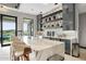 Modern wet bar with marble countertops and ample storage at 3282 E Palo Verde Dr, Paradise Valley, AZ 85253