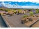 Aerial view of a single-story home with a spacious yard and mountain backdrop at 37415 N 24Th St, Phoenix, AZ 85086