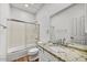 Clean bathroom with shower/tub combo and granite vanity at 37415 N 24Th St, Phoenix, AZ 85086