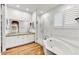 Spa-like bathroom featuring a soaking tub and granite counters at 37415 N 24Th St, Phoenix, AZ 85086