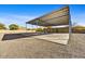 Covered parking area with concrete slab and metal roof at 37415 N 24Th St, Phoenix, AZ 85086