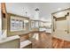 Bright dining area with hardwood floors and kitchen views at 37415 N 24Th St, Phoenix, AZ 85086