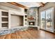 Stone fireplace with built-in shelving units at 37415 N 24Th St, Phoenix, AZ 85086