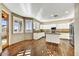 Modern kitchen with white cabinets, granite counters, and stainless steel appliances at 37415 N 24Th St, Phoenix, AZ 85086