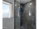 Large walk-in shower with marble tile at 4524 E Walatowa St, Phoenix, AZ 85044