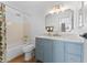 Updated bathroom with a light blue vanity and marble countertop at 4600 N 68Th St # 370, Scottsdale, AZ 85251