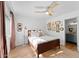 Spacious bedroom with wood bed frame and ensuite bathroom access at 4600 N 68Th St # 370, Scottsdale, AZ 85251