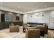 Relaxing lounge area with comfortable seating and vintage game decor at 4849 N Camelback Ridge Dr # A101, Scottsdale, AZ 85251