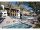Community pool with poolhouse, hot tub, lounge chairs and pristine mountain views at 4849 N Camelback Ridge Dr # A101, Scottsdale, AZ 85251