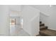 Hallway view of stairs and tile flooring leading to sliding glass door at 5087 E Umber Rd, San Tan Valley, AZ 85143