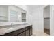 Bathroom boasts double vanity with granite countertop at 5111 E Umber Rd, San Tan Valley, AZ 85143