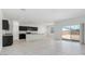 Spacious kitchen with an island and dark cabinets at 5111 E Umber Rd, San Tan Valley, AZ 85143