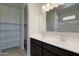 Double vanity bathroom with modern fixtures and ample storage at 5152 E Umber Rd, San Tan Valley, AZ 85143