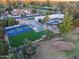 Aerial view of house, pool, and sports court at 5817 E Leith Ln, Scottsdale, AZ 85254