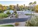 Luxury home with circular driveway and beautifully landscaped front yard at 5817 E Leith Ln, Scottsdale, AZ 85254