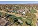 Home nestled on a golf course with lush landscaping; great location and views at 5817 E Leith Ln, Scottsdale, AZ 85254