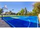 Outdoor basketball court with blue and green surface at 5817 E Leith Ln, Scottsdale, AZ 85254