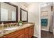 Double vanity bathroom with granite countertops at 5817 E Leith Ln, Scottsdale, AZ 85254
