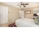 Cozy bedroom with a bed and access to hallway at 5817 E Leith Ln, Scottsdale, AZ 85254