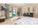 Bedroom with sliding door access to the pool and patio areas at 5817 E Leith Ln, Scottsdale, AZ 85254