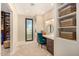 Spacious walk-in closet with built-in shelves and drawers at 5817 E Leith Ln, Scottsdale, AZ 85254