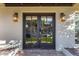 French doors entryway with stone tile flooring at 5817 E Leith Ln, Scottsdale, AZ 85254