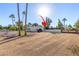 House exterior with a long driveway and gated entry at 5817 E Leith Ln, Scottsdale, AZ 85254