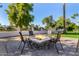Stone fire pit surrounded by comfortable seating at 5817 E Leith Ln, Scottsdale, AZ 85254