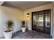 Modern front door with frosted glass panels at 5817 E Leith Ln, Scottsdale, AZ 85254