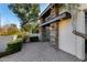 Inviting front entrance with stone pillars and a paved walkway at 5817 E Leith Ln, Scottsdale, AZ 85254