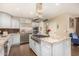 Spacious kitchen with granite countertops, stainless steel appliances, and an island at 5817 E Leith Ln, Scottsdale, AZ 85254