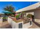 Outdoor kitchen with grill, prep space and seating area at 5817 E Leith Ln, Scottsdale, AZ 85254