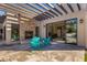Outdoor patio with pergola, fireplace, and seating area at 5817 E Leith Ln, Scottsdale, AZ 85254
