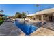 Inviting pool with spacious patio and outdoor kitchen at 5817 E Leith Ln, Scottsdale, AZ 85254