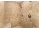 Walk-in shower with tan tile and built-in seat at 5817 E Leith Ln, Scottsdale, AZ 85254