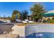 Waterfall feature flows into a relaxing pool area at 5817 E Leith Ln, Scottsdale, AZ 85254
