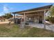 Covered patio, grill, and a swing set in the backyard at 616 W Toledo St, Chandler, AZ 85225