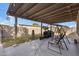 Covered patio with hanging lights and comfortable seating at 616 W Toledo St, Chandler, AZ 85225