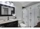 Clean bathroom with updated vanity and palm tree shower curtain at 616 W Toledo St, Chandler, AZ 85225
