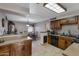 Kitchen with wooden cabinets and modern appliances at 616 W Toledo St, Chandler, AZ 85225