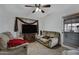 Cozy living room with two sofas and a large TV at 616 W Toledo St, Chandler, AZ 85225