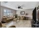 Living room featuring tiled floor and window shutters at 616 W Toledo St, Chandler, AZ 85225